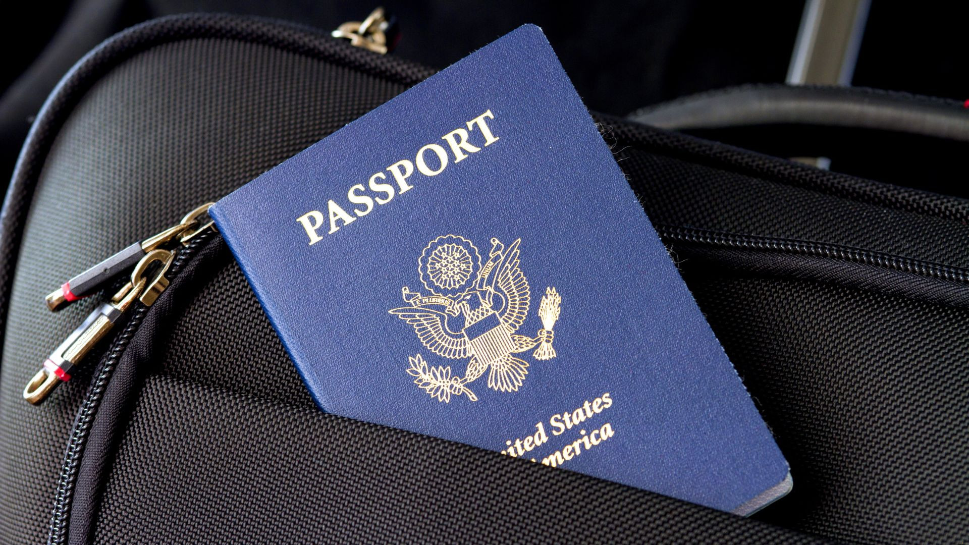 American Passport in a Black Suitcase